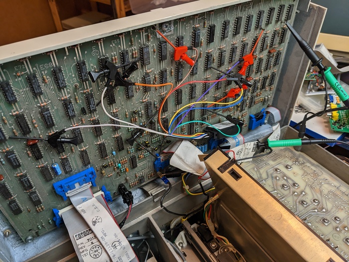 The mess of wires from probing things spread across the board.